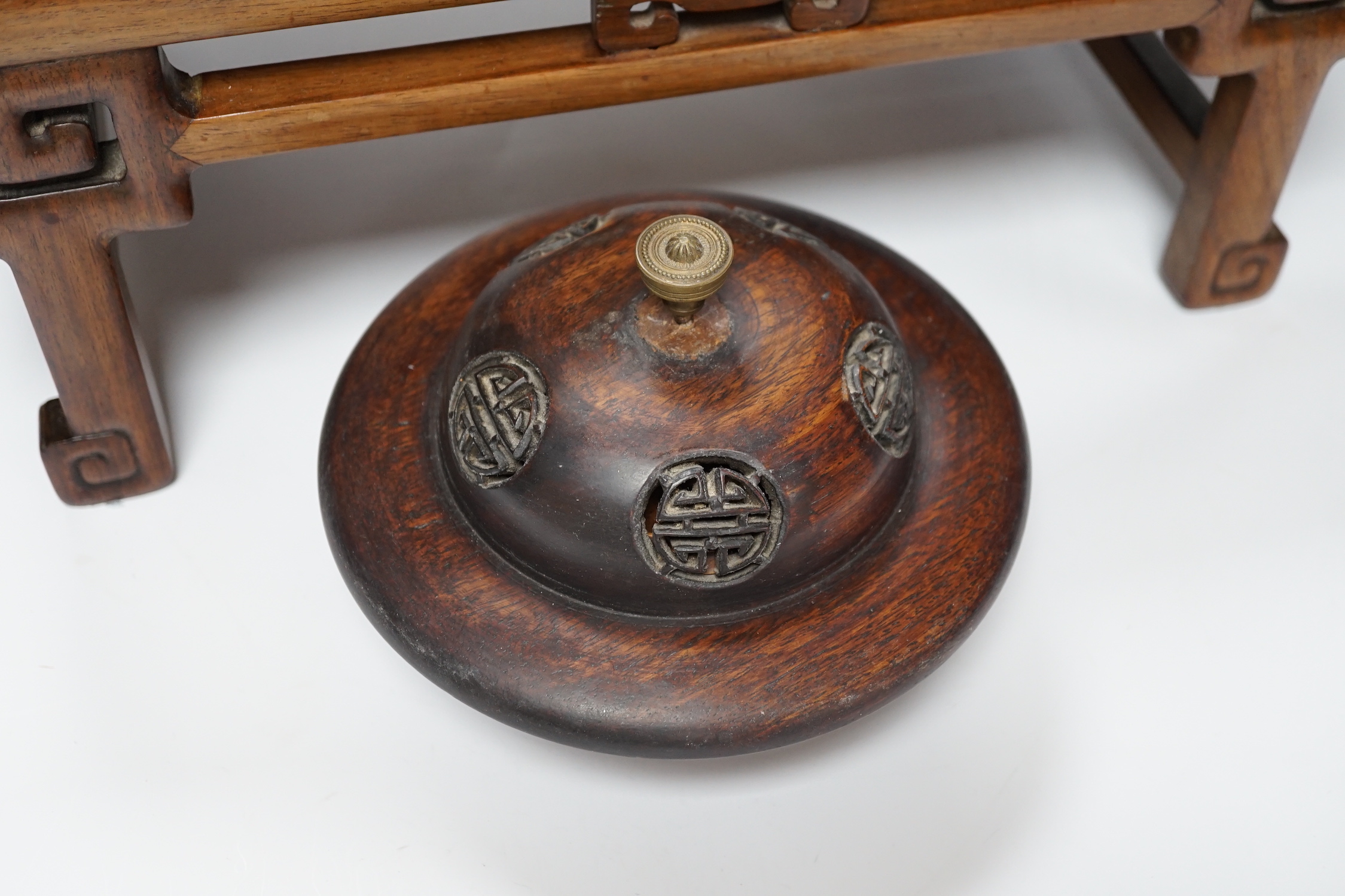 Nine Chinese hardwood vase stands, two hardwood covers and a Chinese hongmu table shaped stand, table 39cm x 25cm x 16.5cm